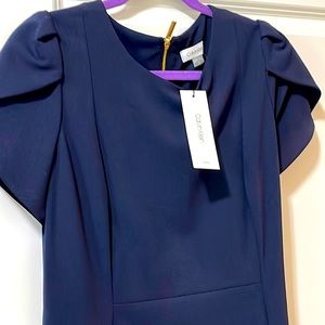 Midi length trumpet hem navy dress
